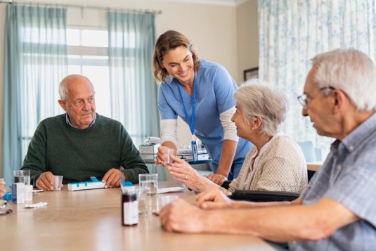 5 Effective Ways to Handle Common Problems and Complaints in Nursing Homes nurse-giving-medicine-to-seniors